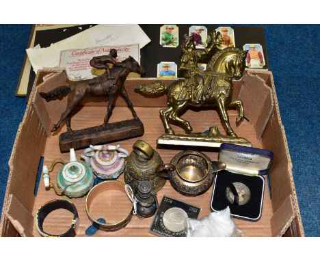 A BOX OF HORSE RACING INTEREST, COINS, METALWARES AND SUNDRY ITEMS, to include a resin sculpture of Lester Piggott on horseba