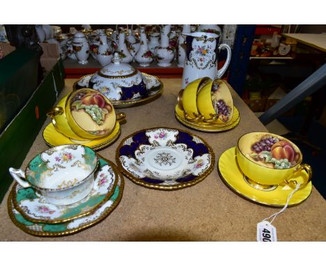 A GROUP OF AYNSLEY 'ORCHARD GOLD' YELLOW CUPS AND COALPORT BATWING TEAWARES comprising Aynsley 'Orchard Gold' yellow five tea