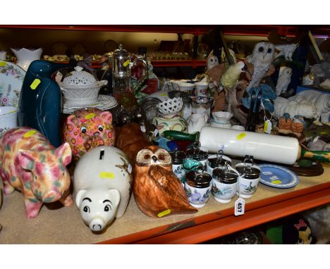 A GROUP OF CERAMICS AND ANIMAL ORNAMENTS, comprising six Royal Worcester egg coddlers (four in the 'Woodland' pattern and two