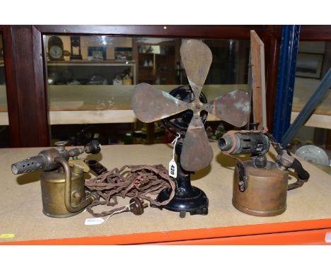 A VINTAGE DESK FAN AND TWO BLOW TORCHES, the adjustable four bladed fan in need of some attention, height to top of blade app