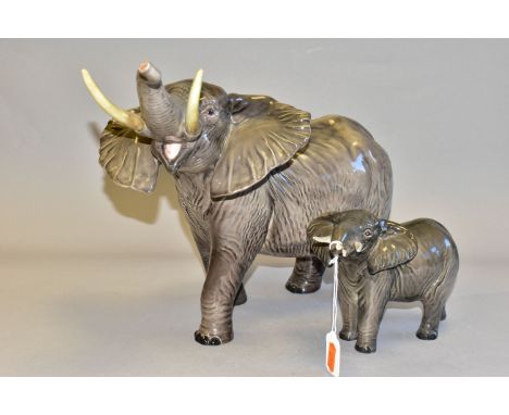 TWO BESWICK ELEPHANT FIGURES, comprising Elephant - Trunk Stretching - Small model no 974 height 12cm, and Elephant - Trunk S