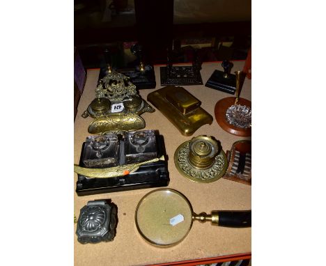 A COLLECTION OF DESK STANDS AND ACCESSORIES, to include a brass double inkwell desk stand with pen rest and tray, the latter 