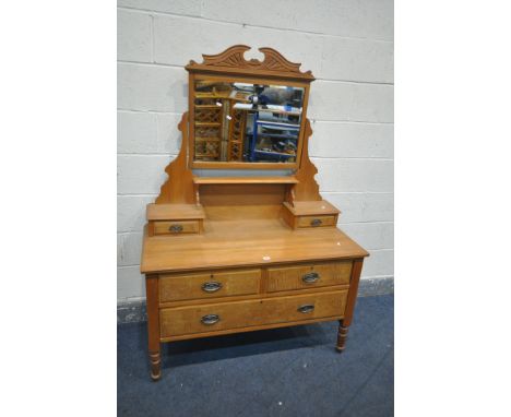 AN EDWARDIAN SATINWOOD DRESSING CHEST, with a single swing mirror, and two drawers, on a base with two short over one long dr