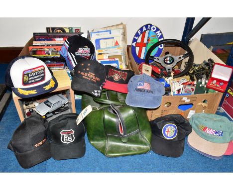 THREE BOXES OF CAR RALLY AND RACING BOOKS, EPHEMERA AND HATS, to include a vintage Alfa Romeo 100+ leather bound steering whe