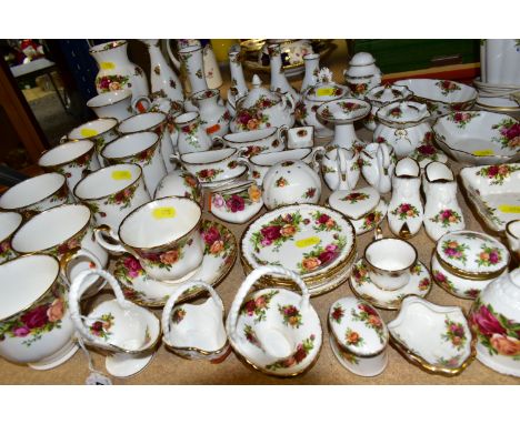 A QUANTITY OF ROYAL ALBERT 'OLD COUNTRY ROSES' PATTERN GIFT WARE, comprising ten assorted mugs, one tea cup and saucer, a twi