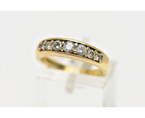 AN 18CT YELLOW GOLD, DIAMOND HALF ETERNITY RING, set with seven graduated round brilliant cut diamonds, channel set, estimate