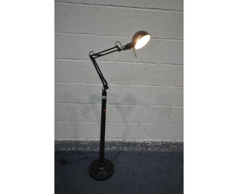 A BESPOKE STANDARD LAMP, adapted from the barrel of a shotgun, and a modern angle poise lamp, approximately 155cm tall