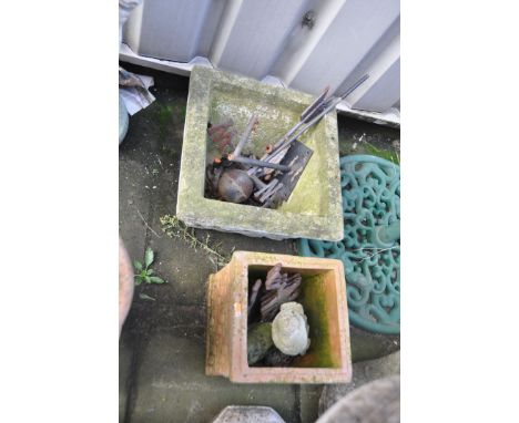 FOURTEEN&nbsp; ITEMS OF GARDEN ORNAMENTS AND FURNITURE including two terracotta pepper pots with lids 55cm high, a composite 