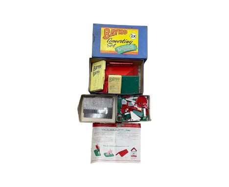 A collection of vintage BAYKO building pieces and sets