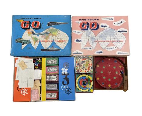 A mixed lot of vintage table-top games to include: - Go: The International Travel Game by Waddingtons - TiddlyWinks - Bagatel