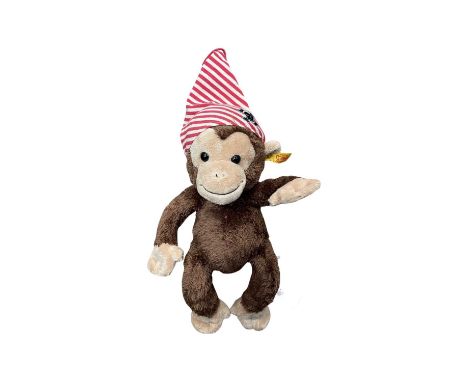 A modern Steiff pirate Monkey 'Scotty', with gold button and yellow tag to ear.
