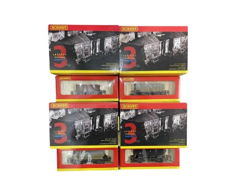 A collection of boxed Hornby 00 gauge triple-pack wagons, to include:  - R6152: 3x HEA Hopper Wagons (weathered) - R6153A: 3x