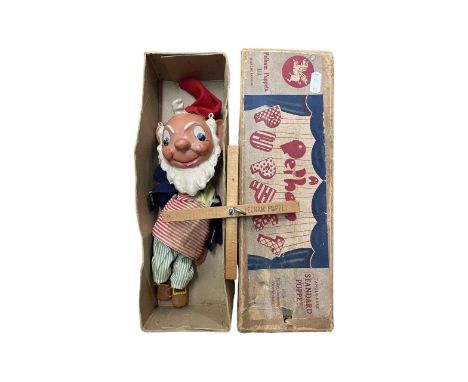 A boxed 1950s Pelham puppet, SL Big Ears from Enid Blyton's Noddy children's series. Requires restringing.