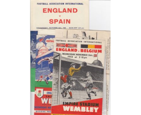 ENGLAND   Three International home programmes plus some songsheets, team sheet and ticket. Programmes are v Belgium 26/11/52 