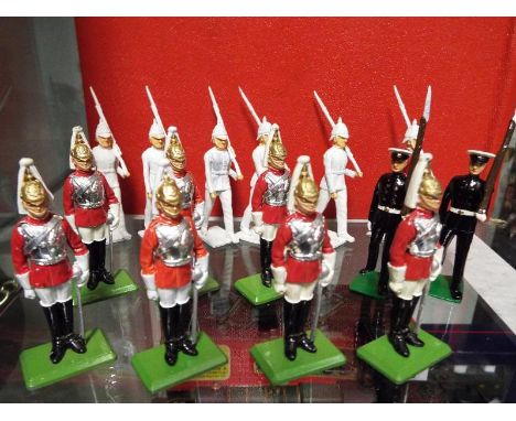 Britains diecast soldiers (and similar) - a collection of sixteen painted diecast model guardsmen 