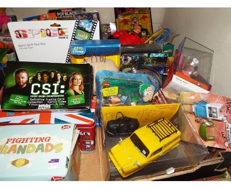 A collection of predominantly sealed boxes and blister packs to include CSI, Spice Girls, The Golden Compass, Fighting Granda