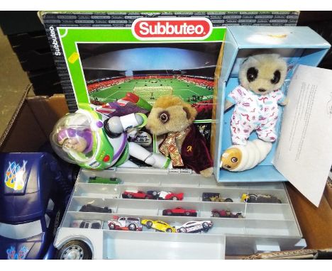 A good mixed lot to include a Subbuteo 60247 table top football game, boxed, a Mattel Buzz Lightyear, a Fastline truck contai