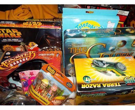 A mixed lot to include sealed blister packs and board games to include Monsters Garage, Star Wars, The Golden Compass, Bob th