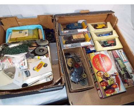 Model Railways - a collection of spares and parts relating to model railways, three boxed diecast model motor vehicles and tw