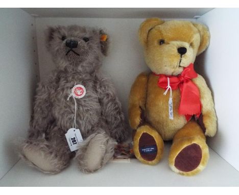 Two Bears comprising a Steiff classic bear, Growler, button in ear with yellow tag # 000553, 37 cm (h) with original Steiff b