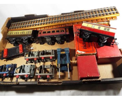 Model Railways - a mixed lot to include a quantity of Hornby tinplate 0 gauge rolling stock to include a near mint passenger 