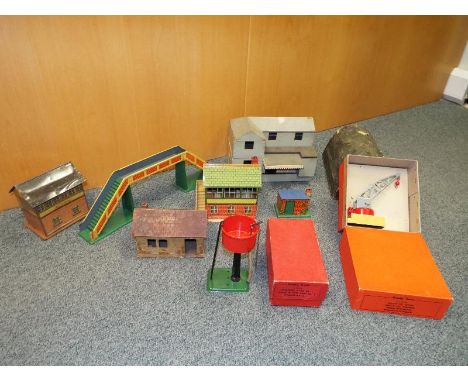 Model Railways - a collection of Hornby tinplate O gauge scenics and similar to include a platform crane, mint in box, a wate
