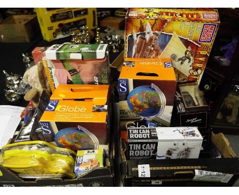 Two boxes containing a large collection of children's toys to include Mega Blocks Pyrates, two political globes, boxed, tin c