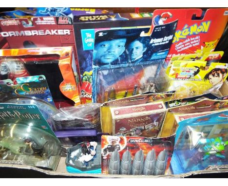 A collection of predominantly sealed blister packs to include the Golden Compass, Harry Potter, Storm Breaker, Star Wars, Nar