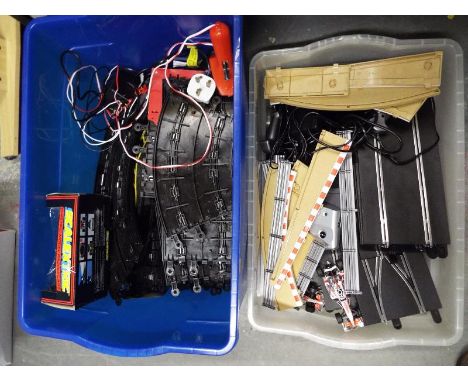 Two boxes containing a collection of Scalextric to include cars, track, controllers and similar (2)