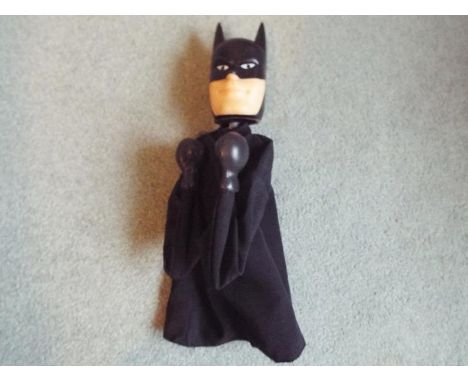 Batman - a rare punching glove puppet, mechanical punching action with hard moulded head and cloth body 