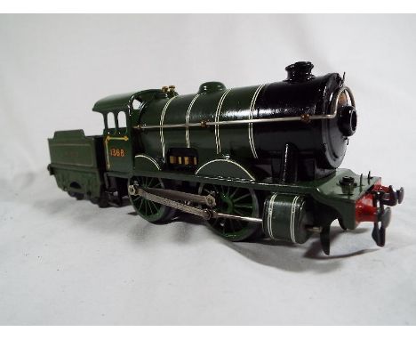 Model Railways - a Hornby tinplate O gauge E120 special locomotive and tender Op No. 1368 green LNER livery 20v motor, bulb h