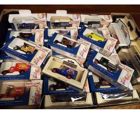 A collection of 26 diecast model motor vehicles by Days Gone, mint in box