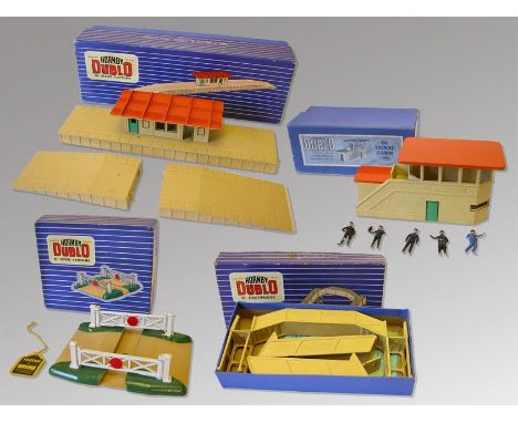 Model railways - a collection of Hornby Dublo scenics comprising Island Platform D1, Signal Cabin, Level Crossing, Girder Foo