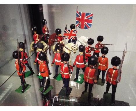 Britains diecast soldiers (and similar) - a collection of seventeen painted diecast model guardsmen 