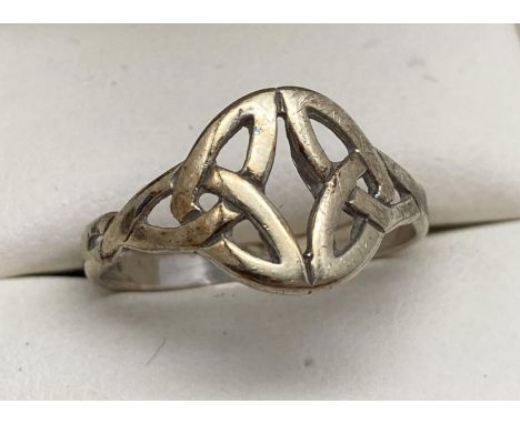 A 9ct gold dress ring with circular Celtic pierced work design, Ring size N½. Total weight approx. 1.7g. 