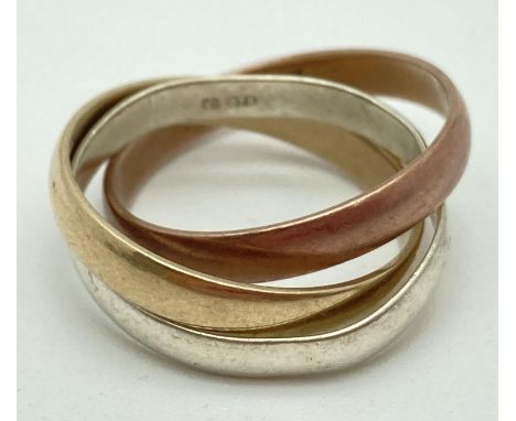 A tri coloured 9ct gold Russian wedding ring. White gold band slightly misshapen. Gold marks to inside of yellow gold band. R