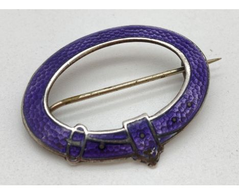 An early 20th century silver and purple enamel pin back brooch in the form of a belt and buckle. Fully hallmarked to reverse 