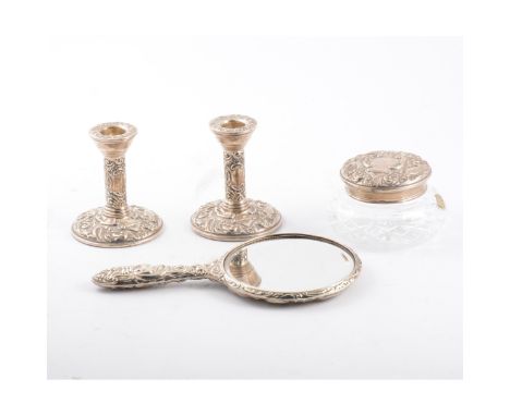 Edwardian style matched silver dressing table set, Birmingham circa 1973, comprising a pair of dwarf candlesticks, filled, 10