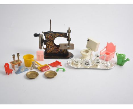 A collection of wood, metal and plastic doll's house furniture and accessories, circa 1950, a child's German vintage metal se