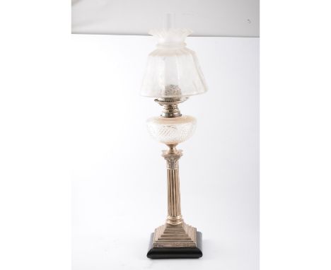 Silver Corinthian column table lamp, probably by the Goldsmiths & Silversmiths Co., London 1903, cut-glass reservoir complete