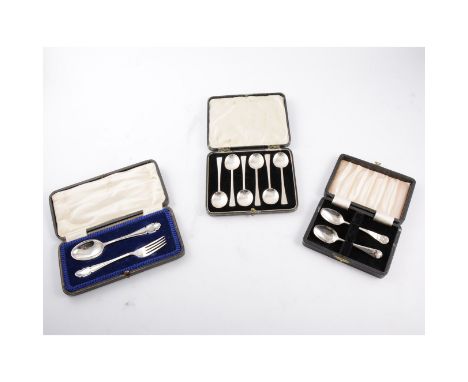 Cased sets of silver flatware, a case of flat top coffee spoons, Birmingham 1924, a set of tea knives silver filled handles, 