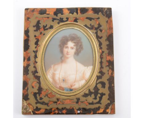 Oval portrait miniature, of a young lady, half length, in a decollete dress, in a rectangular boulle-work frame, 13 x 11cm ov