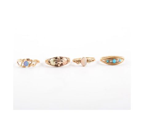 Four gem set rings, two oval cabochon cut single stone rings in 9 carat yellow gold mounts, a turquoise and pearl boat shape 