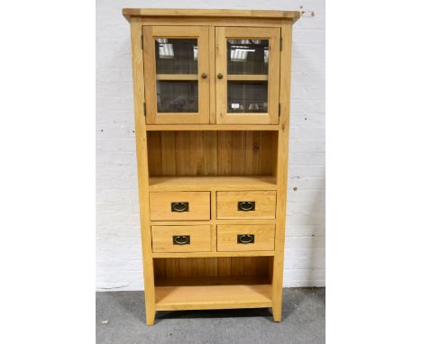 Contemporary oak bookcase, rectangular top, glazed doors enclosing a shelf above an open section and drawers, width 91cm dept