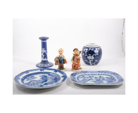 Charlotte Rhead charger in the "Persian Rose" design no 4040, 36cm diameter, a Wedgwood jasperware candlestick 18cm, blue and