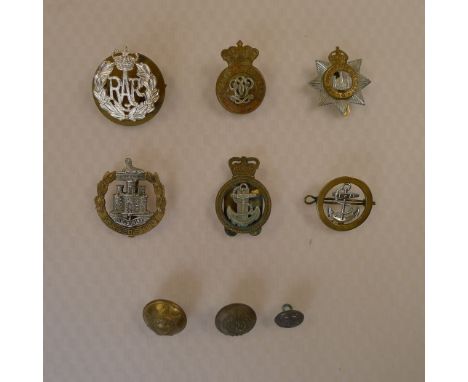 6 x various vintage (Kings crown) and more recent (Queens Crown) metal cap badges and 3 x brass buttons. The cap badges compr