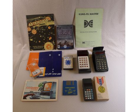 A collection of vintage calculators , computer , technology related items comprising a vintage Hewlett Packard HP 45 Scientif