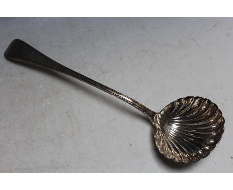 A HALLMARKED SILVER SCALLOPED BOWL LADLE - LONDON 1956, approx weigh 235g, L 33.25 cm