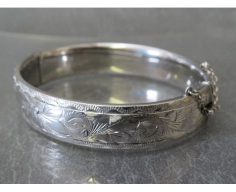 GEORG JENSEN - HALLMARKED SILVER HINGED BANGLE, with foliate decoration to one side, makers mark GJLd