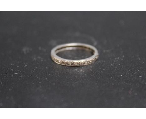 A DIAMOND ETERNITY RING, set in unmarked white metal - possibly platinum, approx weight 3.7g, ring size S1/2